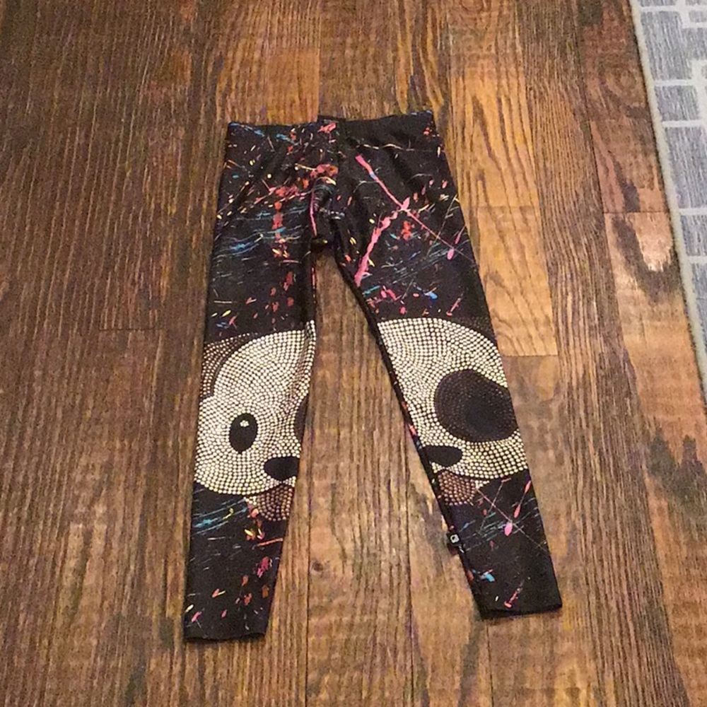 Black splatter painted leggings with the dog emoji